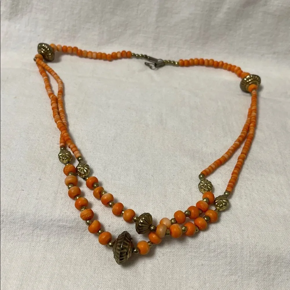 Vintage Orange Beaded Necklace with Gold Accents 14” long.